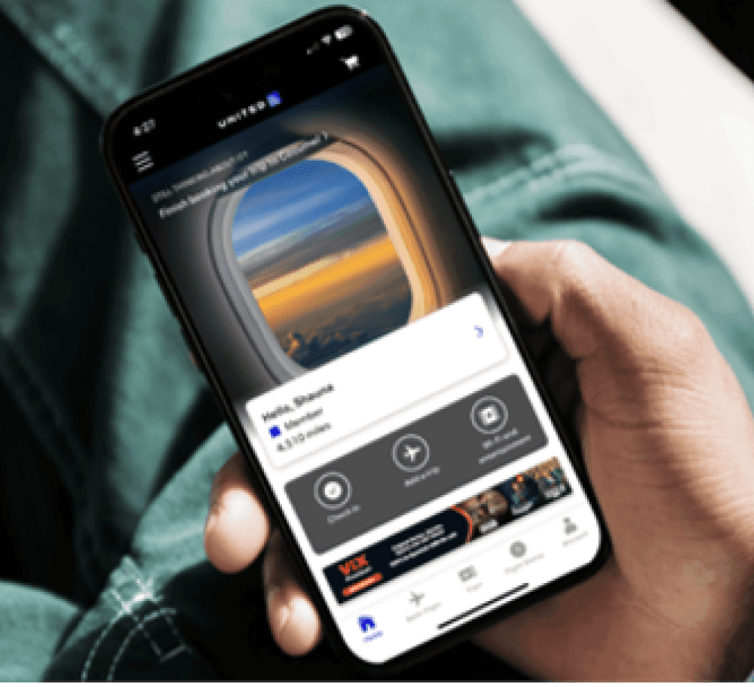 Hand holding a cellphone with a Cayman Island ad on the screen.